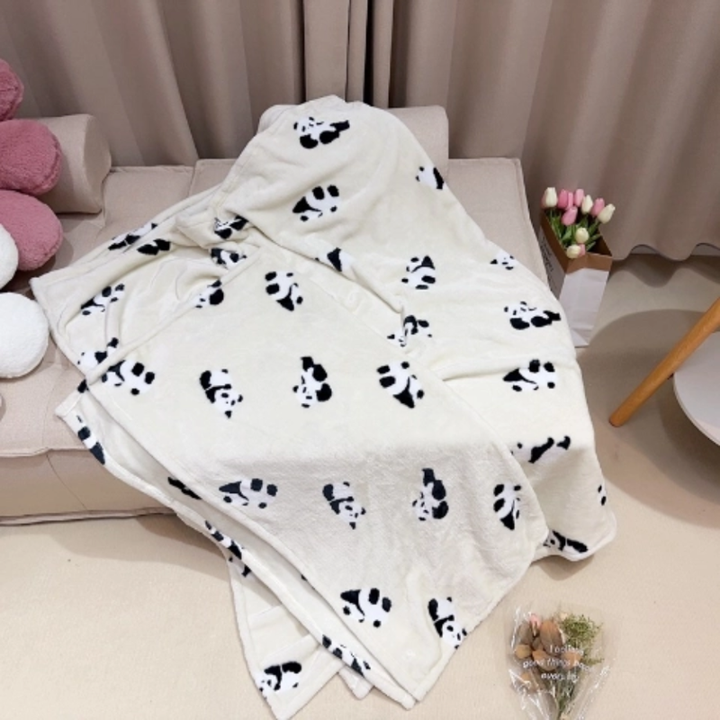 Muhkea Panda-fleece torkkupeitto